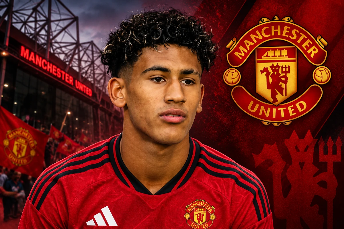 JJ Gabriel in a Manchester United shirt with the club crest and stadium background